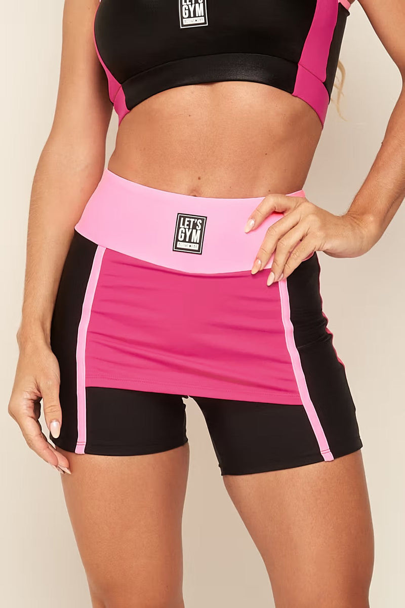 Conjunto Fitness Elláda Rosa: Top Elegante e Shorts Saia Confortáveis